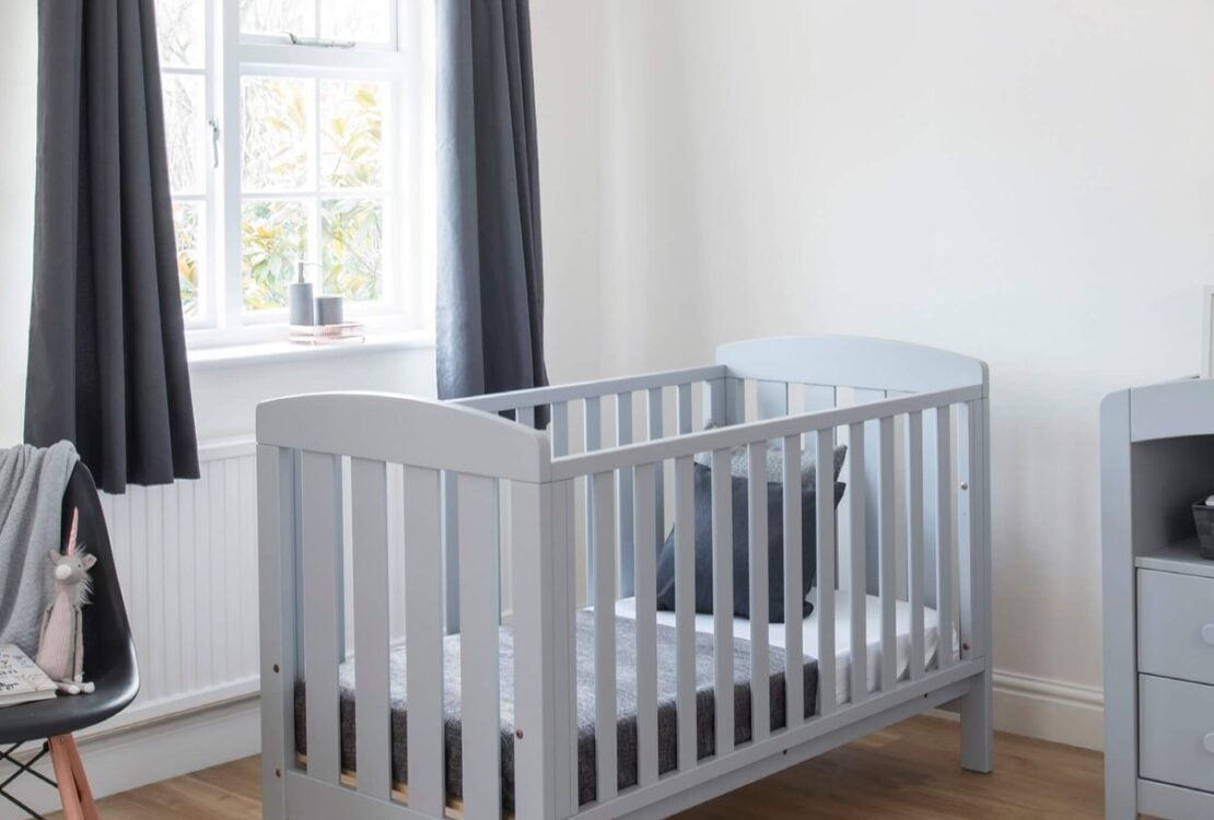 Alice Cot Bed in a nursery setting