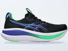 Scarpe da running Asics Gel Nimbus 28 su fondo neutro