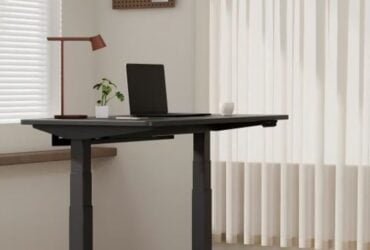 Flexispot home office with a standing desk and walking pad