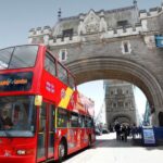 City Sightseeing bus crossing Tower Bridge in London