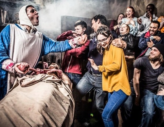 Visitors reacting during The London Dungeon experience