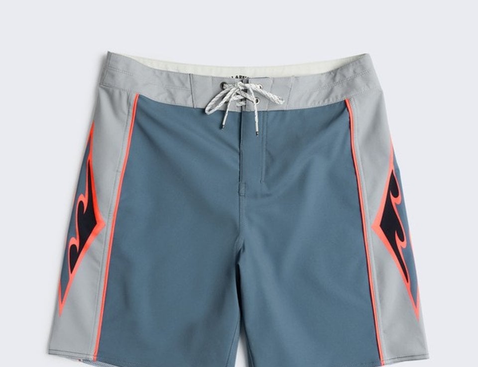 Grey New Wave Pro boardshorts shown from the front
