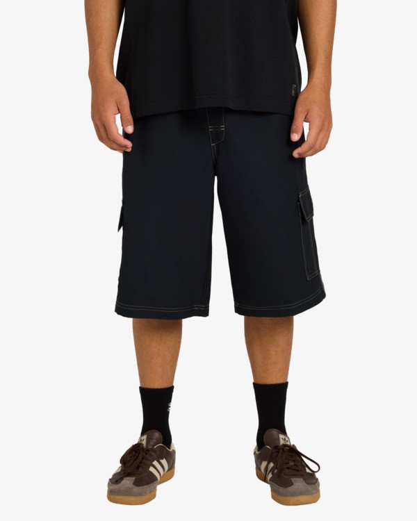 Black Spec 73 swim shorts shown from the front