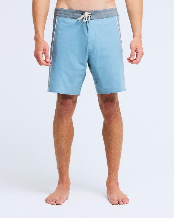 Model wearing multi-colour Ty Williams LT boardshorts