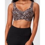 Model wearing a Bravissimo leopard-print bra