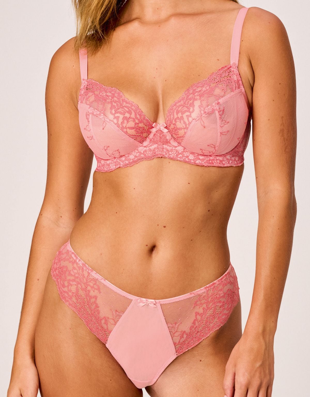 Model wearing pink Bravissimo lingerie