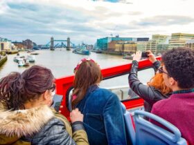 London sightseeing bus moving through the city