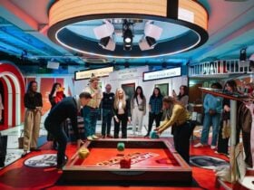Visitors playing together at Monopoly Lifesized in London