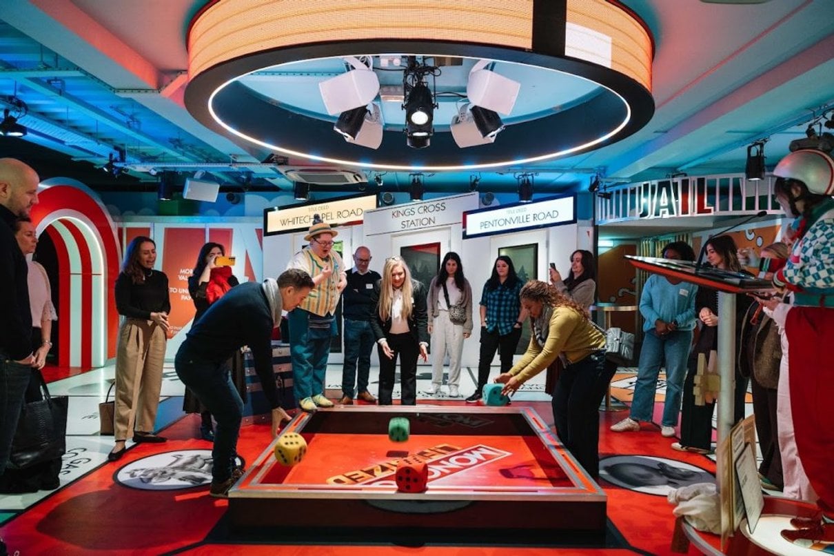 Visitors playing together at Monopoly Lifesized in London