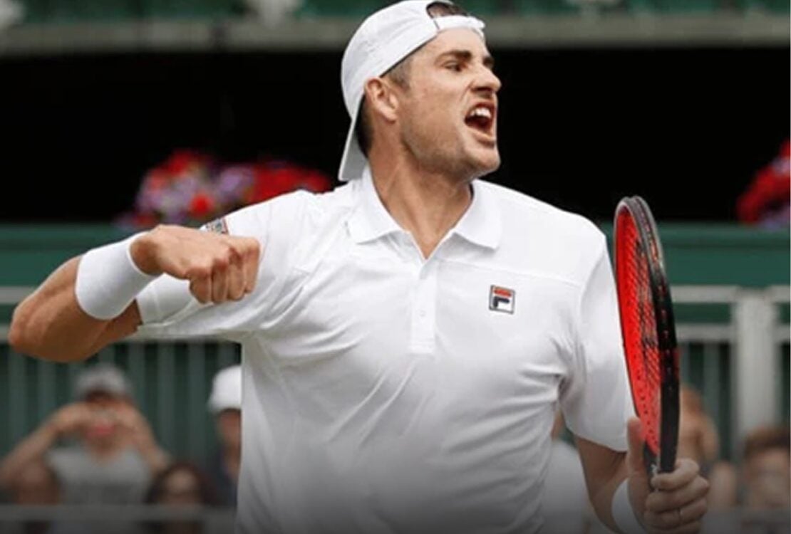 Tennis player celebrating on court