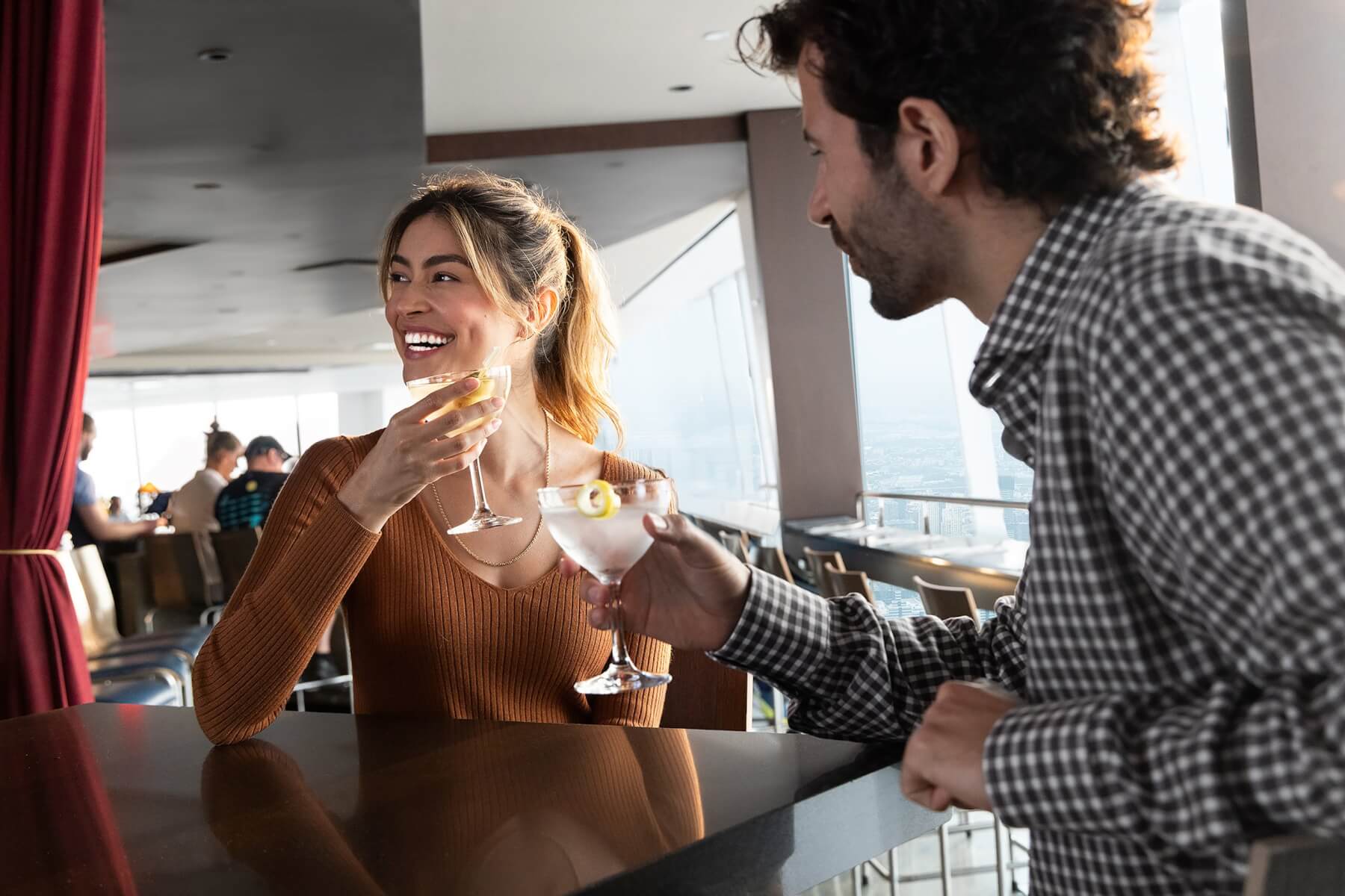 Visitors dining together at One World Observatory