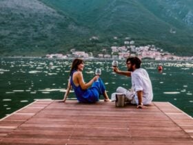 Couple standing together outdoors on a travel insurance page