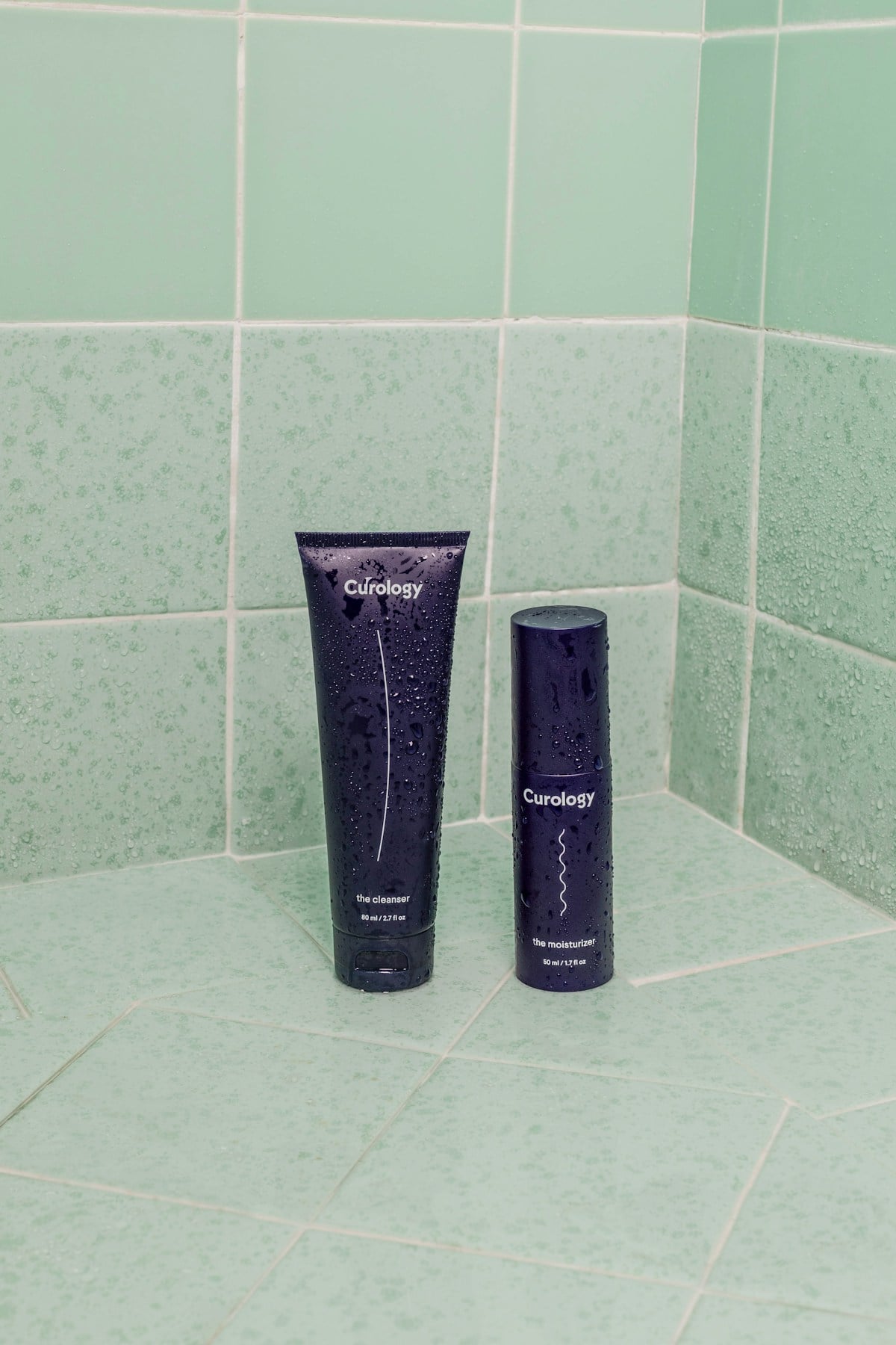 Skincare bottles in a shower