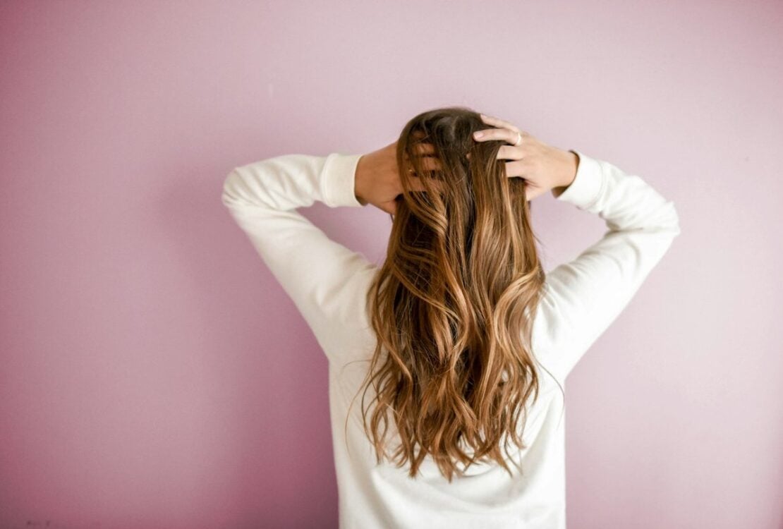Woman showing her long hair