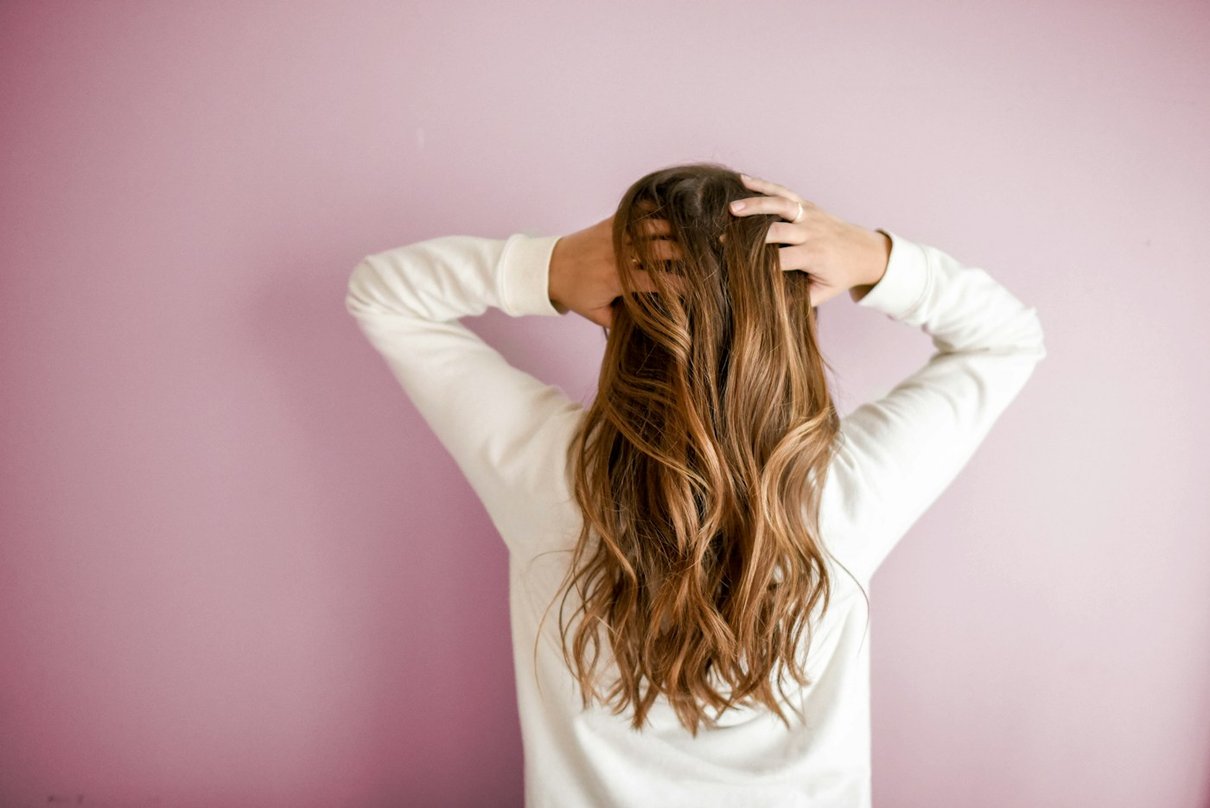 Woman showing her long hair