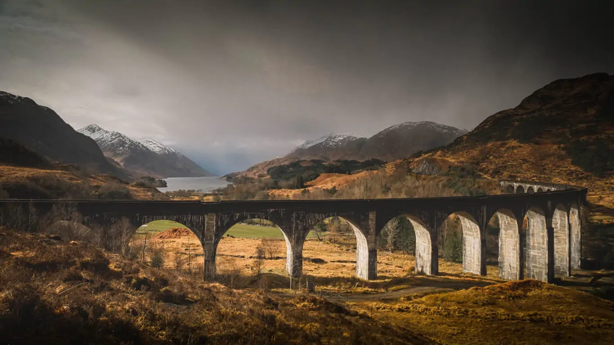 Train crossing the Glenfinnan Viaduct in Scotland