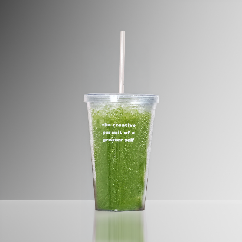 green iced drink in a clear cup