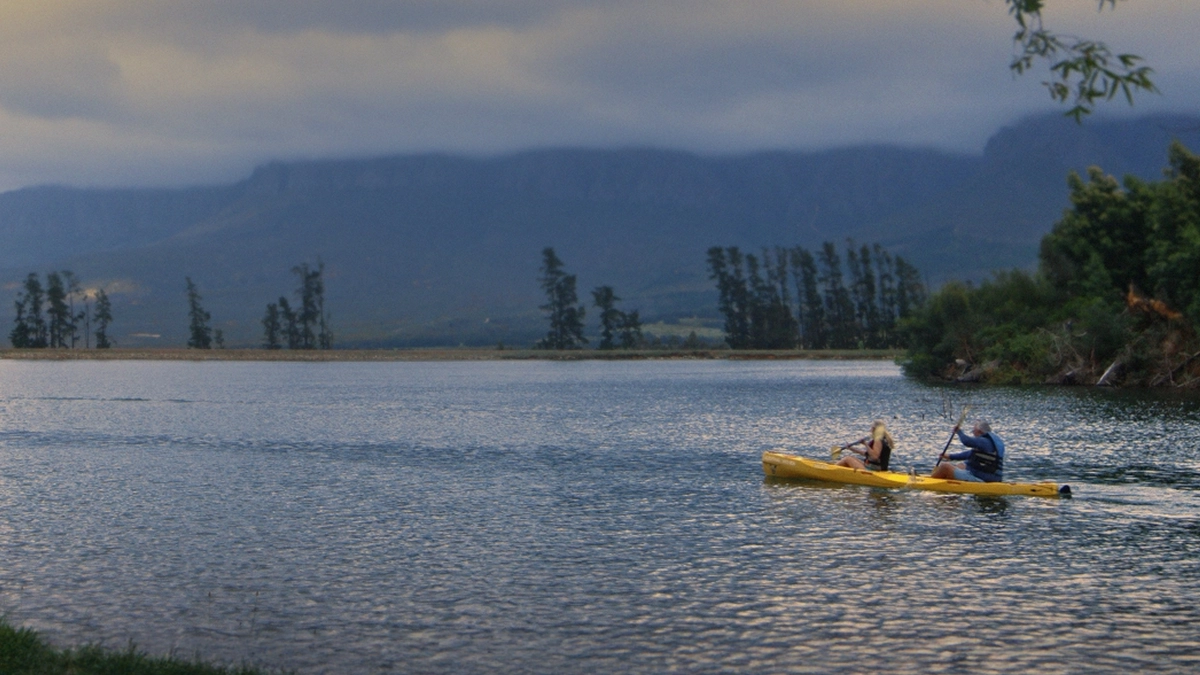 Kayaking on holiday in a scenic landscape