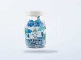 Blue CBD gummy bears in their product tub