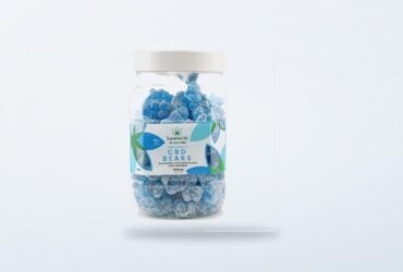 Blue CBD gummy bears in their product tub
