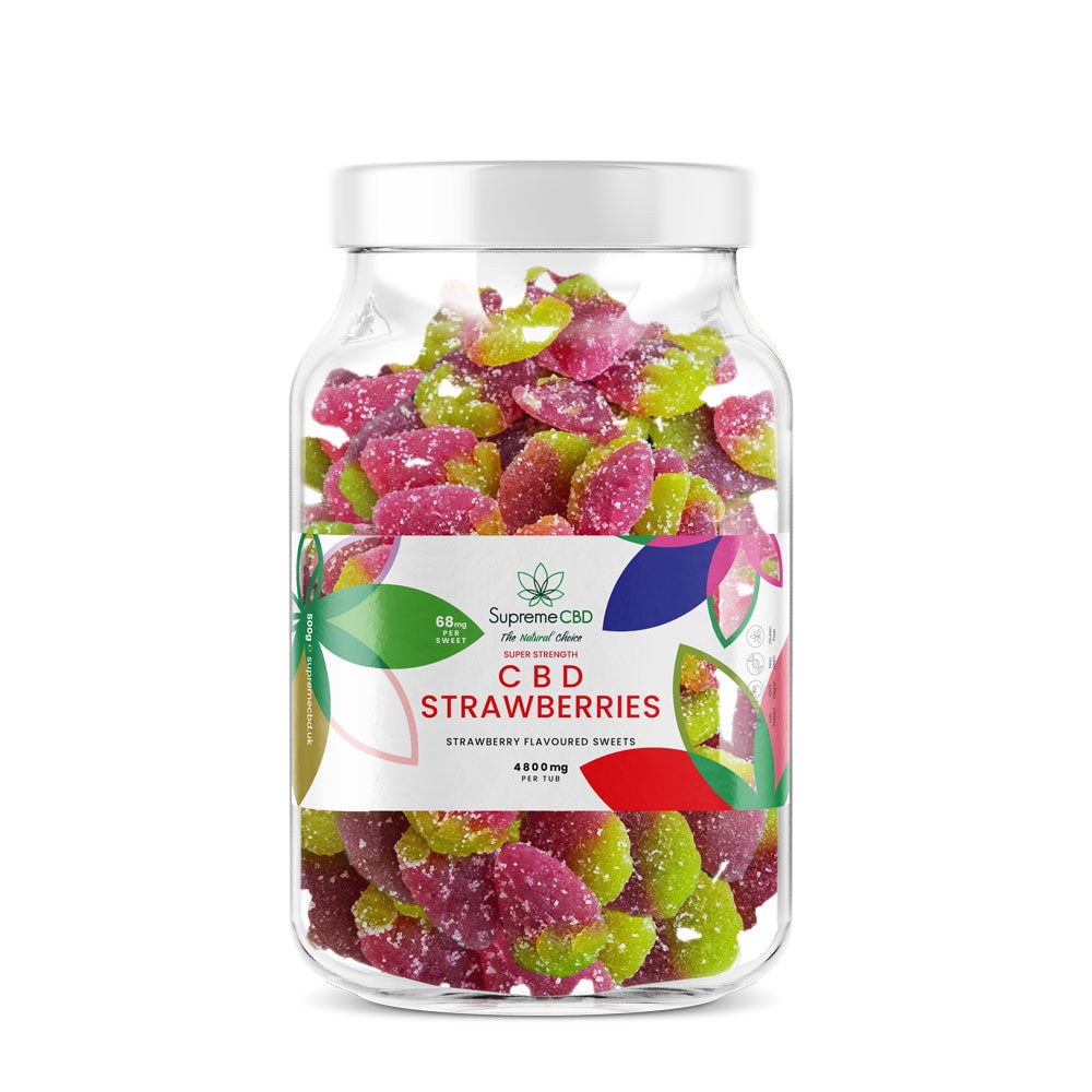 Strawberry CBD edibles in a large tub