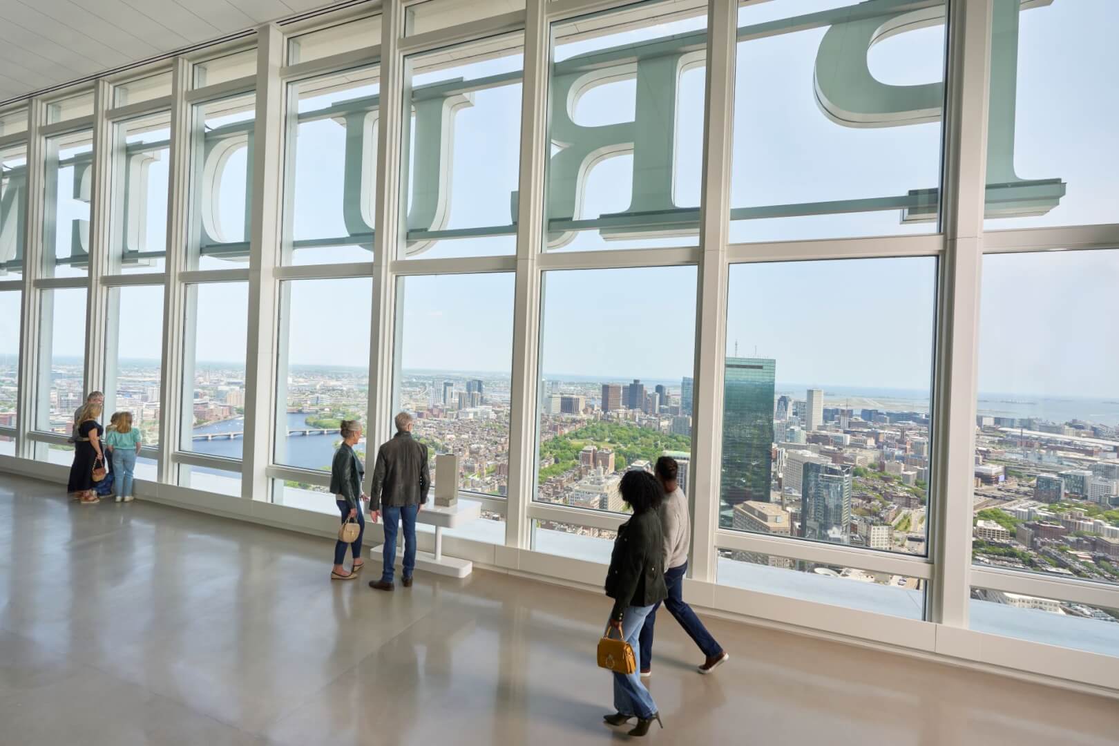 Visitors looking out over Boston from Floor 52