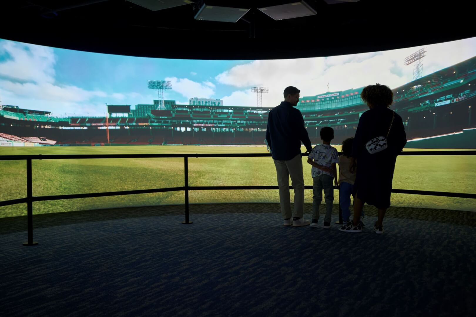 Visitors exploring an immersive Boston exhibit at View Boston