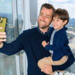 Father and child taking a selfie during a visit to The View from The Shard