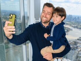 Father and child taking a selfie during a visit to The View from The Shard