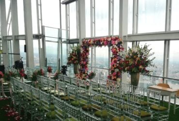 Floral ceremony setting beside the windows above London at The View from The Shard